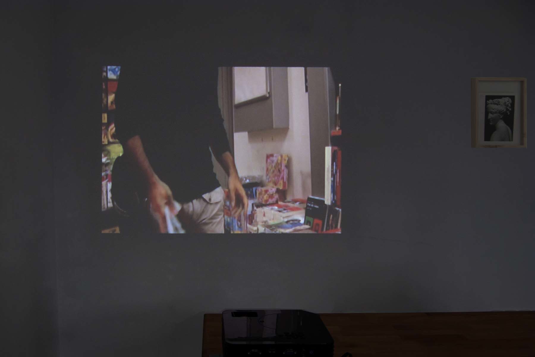 C. Chironi, DK, 2009, video, stolen book page, frame